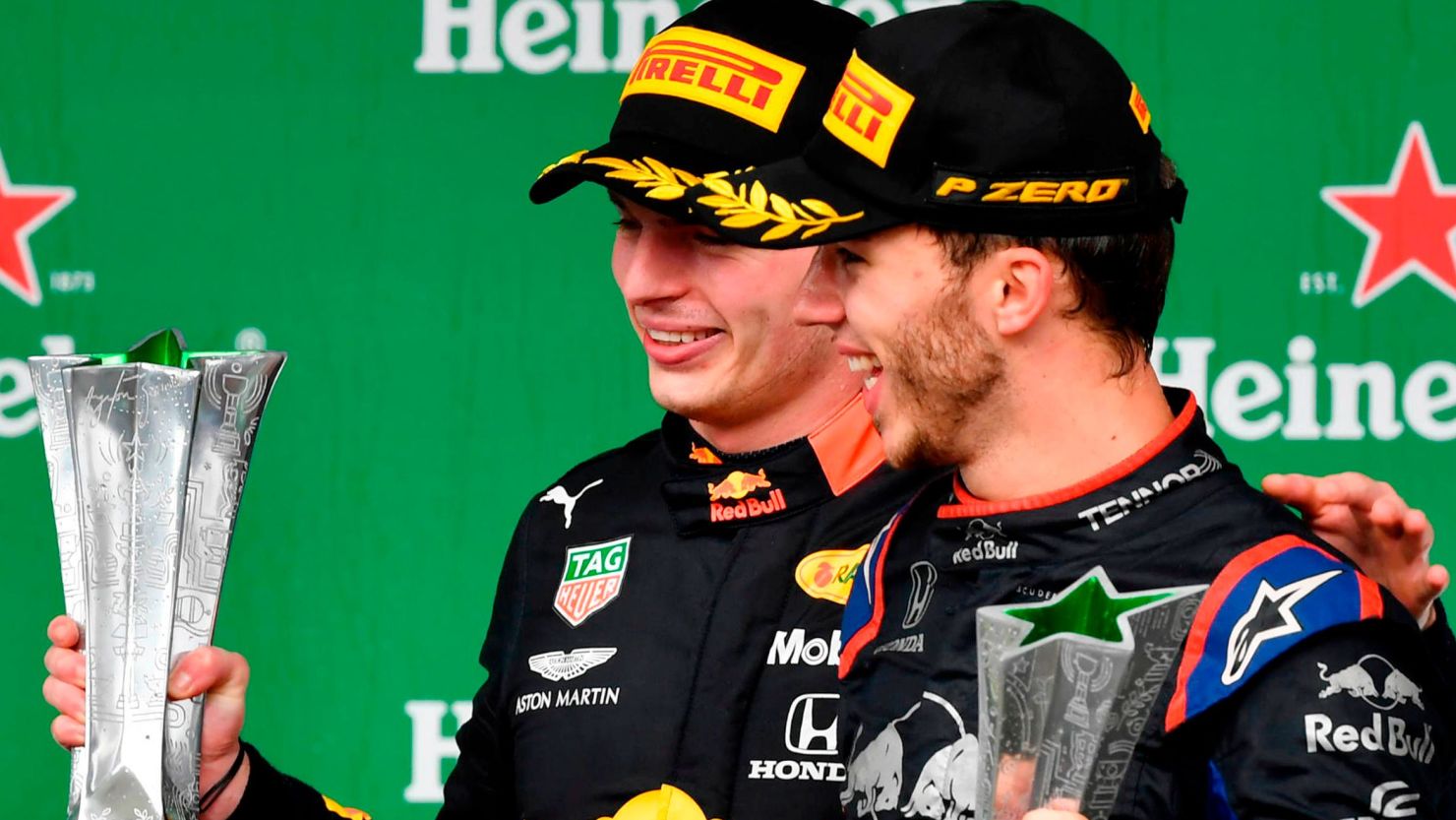 Max Verstappen (left) and Pierre Gasly celebrate after finishing first and second in Brazil.
