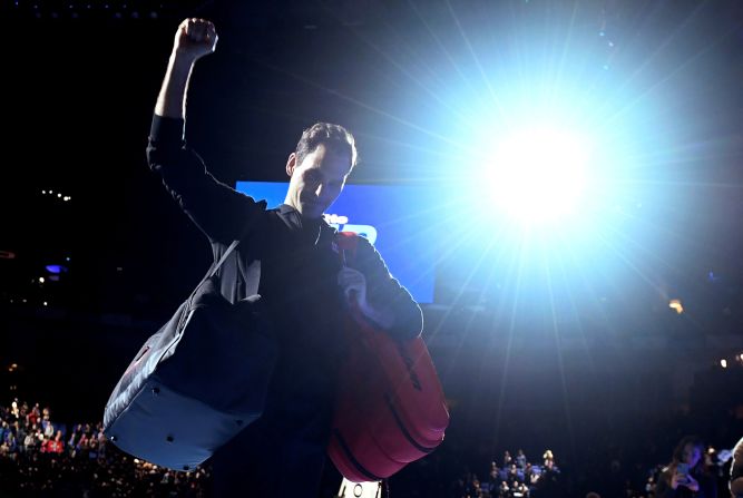 Roger Federer celebrates winning his group stage match against Novak Djokovic at the ATP Finals in London, England, on November 14.