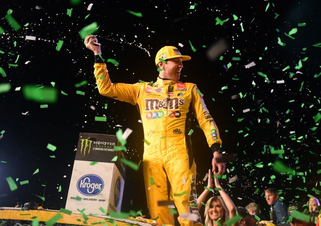 Kyle Busch celebrates in Victory Lane after winning the NASCAR Cup Series Championship at Homestead-Miami Speedway in Homestead, Florida, on November 17.