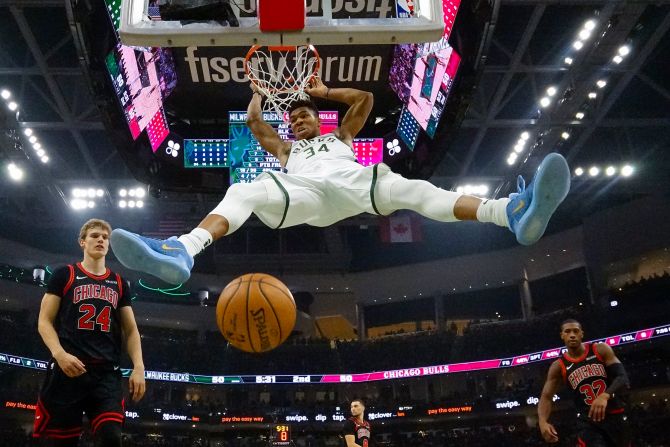 Milwaukee Bucks' Giannis Antetokounmpo dunks during the first half of an NBA basketball game against the Chicago Bulls in Milwaukee, Wisconsin, on Thursday, November 14.