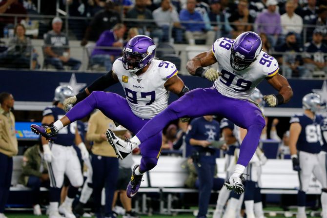 Minnesota Vikings teammates Everson Griffen, left, and Danielle Hunter celebrate sacking Dallas Cowboys quarterback Dak Prescott during the second half of their NFL game in Arlington, Texas, on Sunday, November 10.