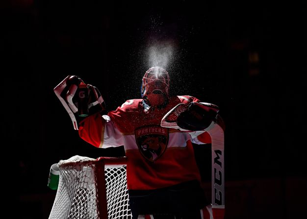 Florida Panthers goaltender Sergei Bobrovsky spits water in the air prior to a game against the Winnipeg Jets at BB&T Center in Sunrise, Florida, on Thursday, November 14.