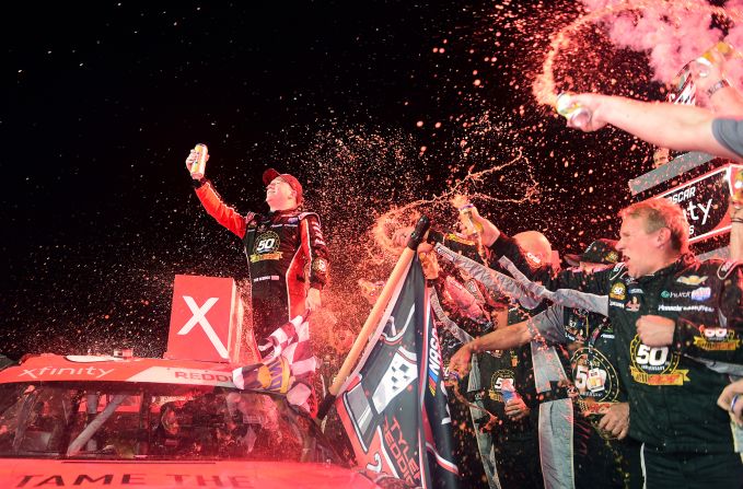 Tyler Reddick celebrates after winning the NASCAR Xfinity Series Ford EcoBoost 300 and the NASCAR Xfinity Series Championship at Homestead-Miami Speedway on Saturday, November 16.