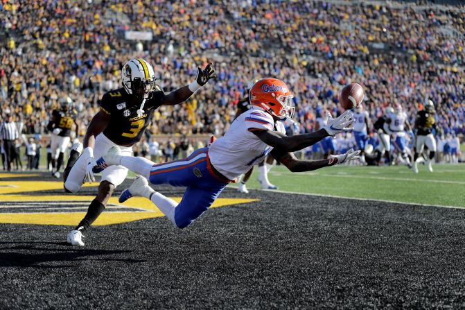 Florida wide receiver Kadarius Toney, right, dives for a pass in the end zone while guarded by Missouri safety Ronnell Perkins during an NCAA football game in Columbia, Missouri, on Saturday, November 16. Toney was unable to haul in the pass.