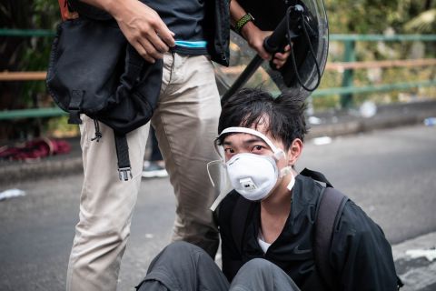 An anti-government protester is detained at Hong Kong Polytechnic University on November 18.