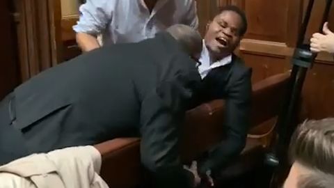 Ebenezer Azamati resisting a security guard in the Oxford Union on October 17, 2019.