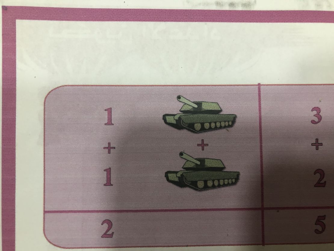 A schoolbook shows how tanks were used in an arithmetic lesson.