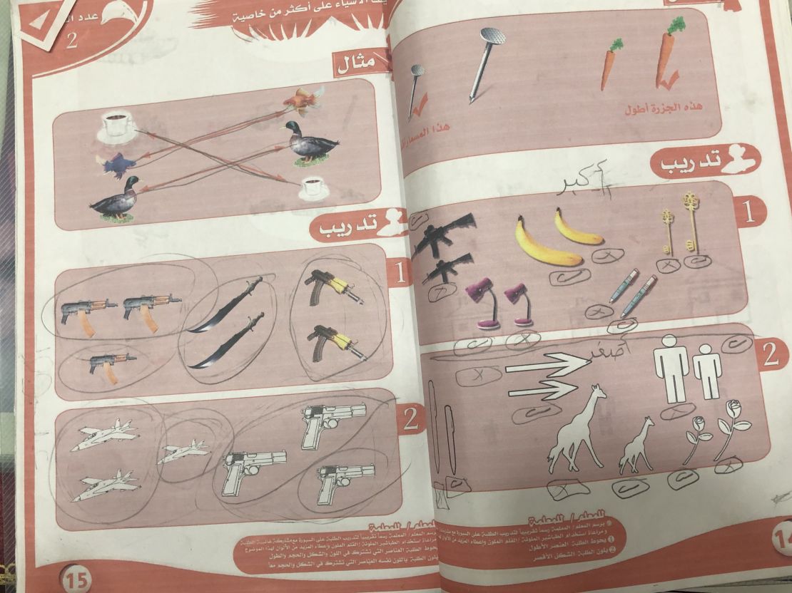 A child's textbook mixes weapons in with bananas and pens as items to count.