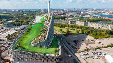 Copenhagen's recently opened waste-to-energy power plant doubles as a ski slope and a hiking trail.