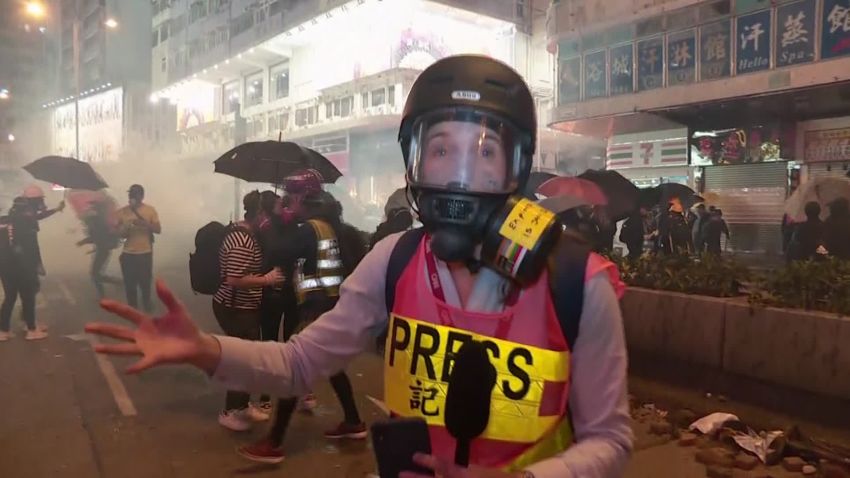 Police charge protesters barricaded at university in Hong Kong