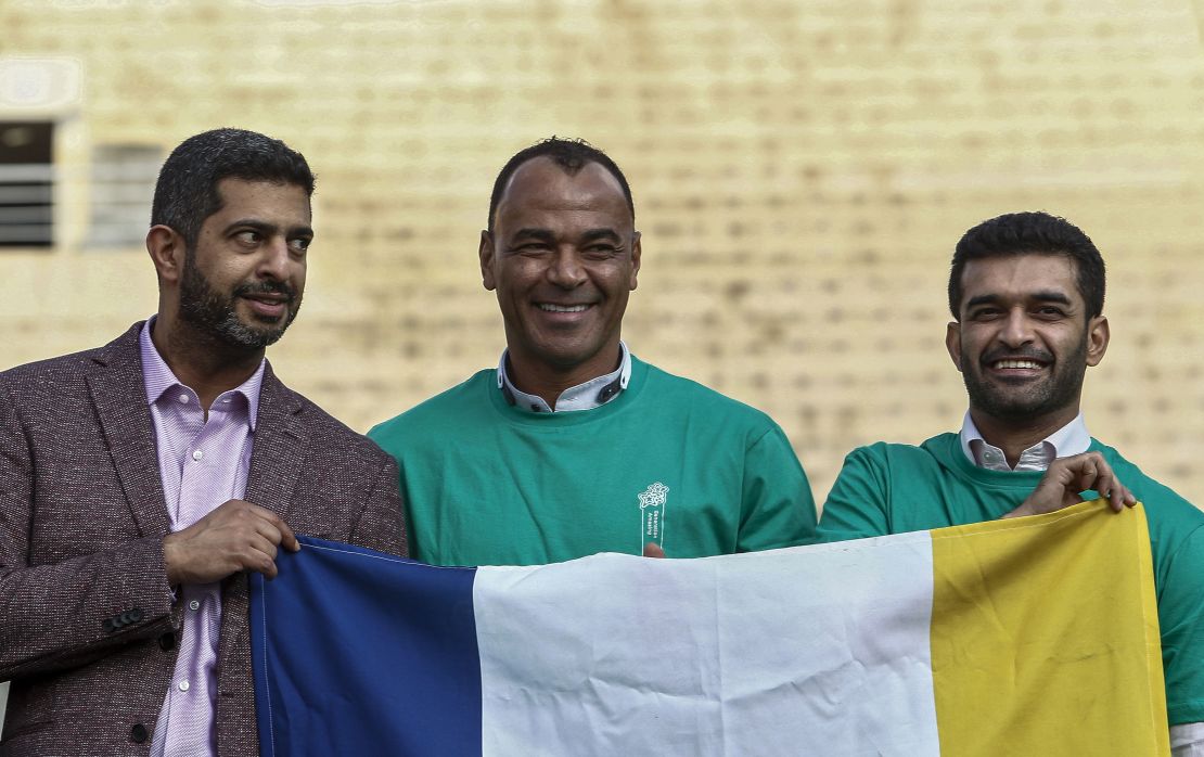 Al-Khater is joined by Brazilian two-time World Cup champion Cafu (middle) and Secretary General of the Supreme Committee for Delivery & Legacy Hassan Al-Thawadi (right).