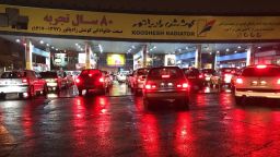 People arrive at gas stations to gas up as protests continue after the government imposed petrol rationing and raised gasoline prices in Tehran, Iran on November 18.