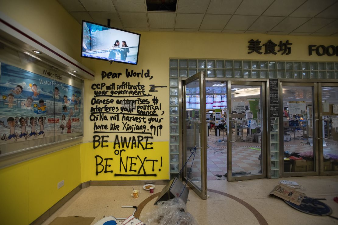Graffiti is seen at the entrance of the canteen, which became something of a headquarters for protesters at PolyU.
