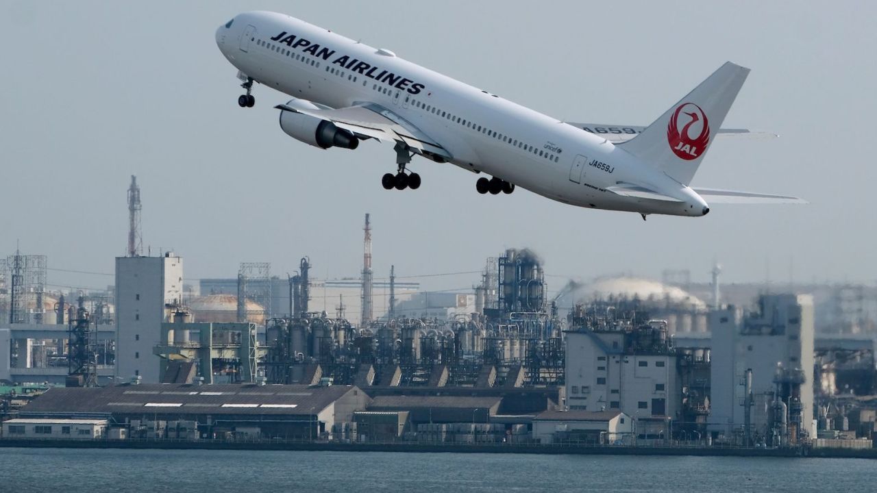 A Japan Airlines passenger jet takes off from Haneda Airport in Tokyo on July 31, 2019.