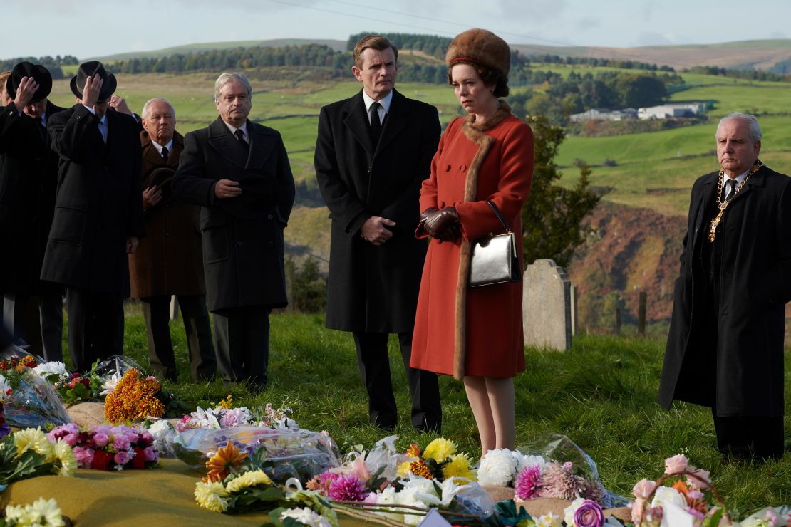 Olivia Colman as Queen Elizabeth in series 3 of 'The Crown.' She is pictured visiting a memorial for the victims of the Aberfan disaster.