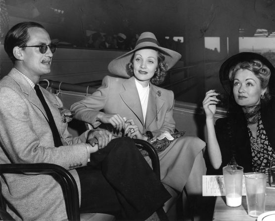 Marlene Dietrich (center) and Constance Bennett (right) with a friend at Santa Anita Park.