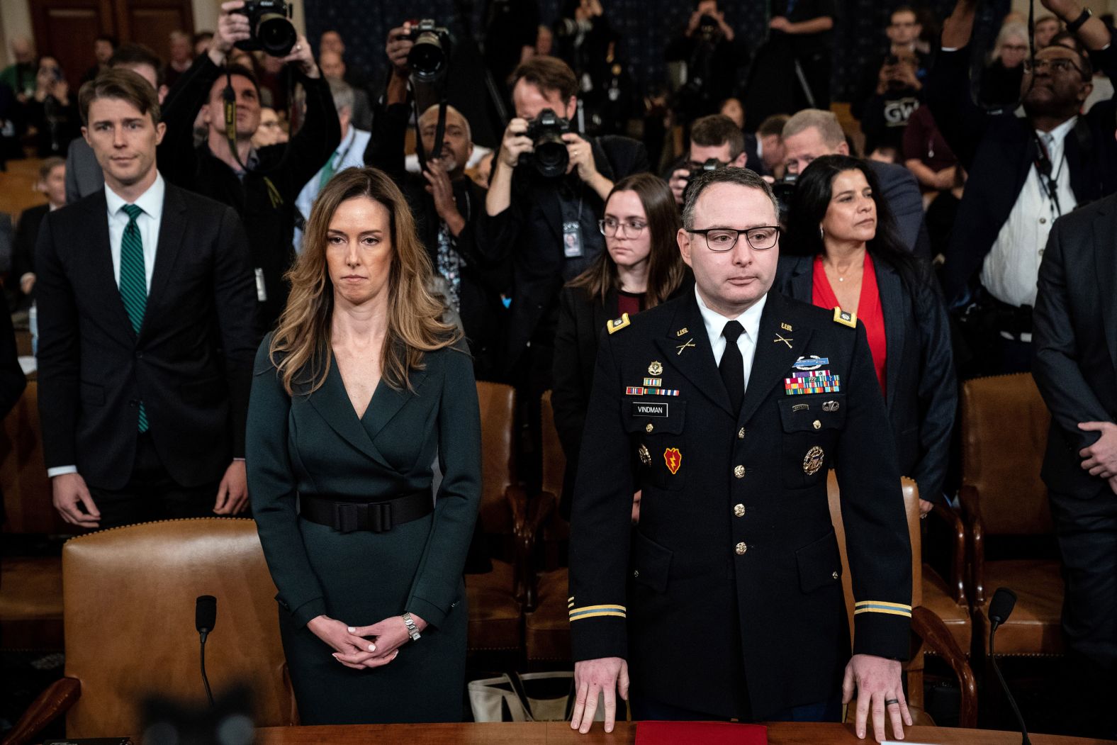 Jennifer Williams, a senior aide to Vice President Mike Pence, and Army Lt. Col. Alexander Vindman, the top Ukraine expert at the National Security Council, await the start of their testimony in Washington on November 19. It was <a href="https://www.cnn.com/2019/11/19/politics/public-impeachment-hearing-day-3/index.html" target="_blank">the third day of public hearings</a> related to the impeachment inquiry.