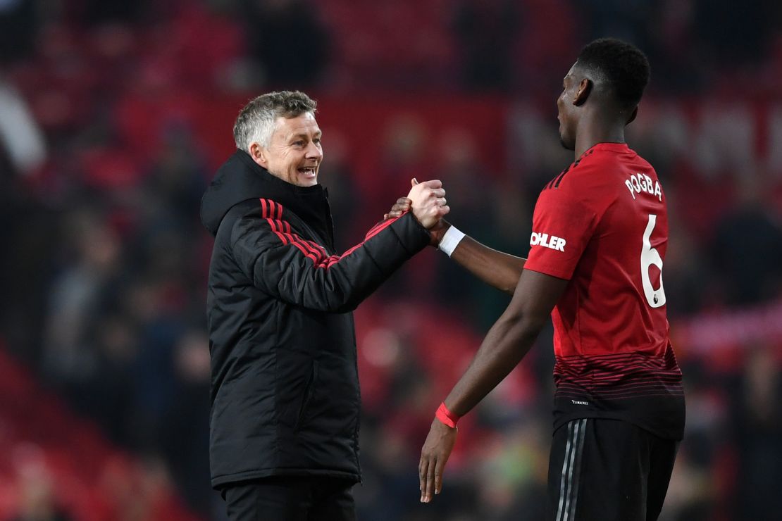 Manchester United manager Ole Gunnar Solskjaer with Pogba.
