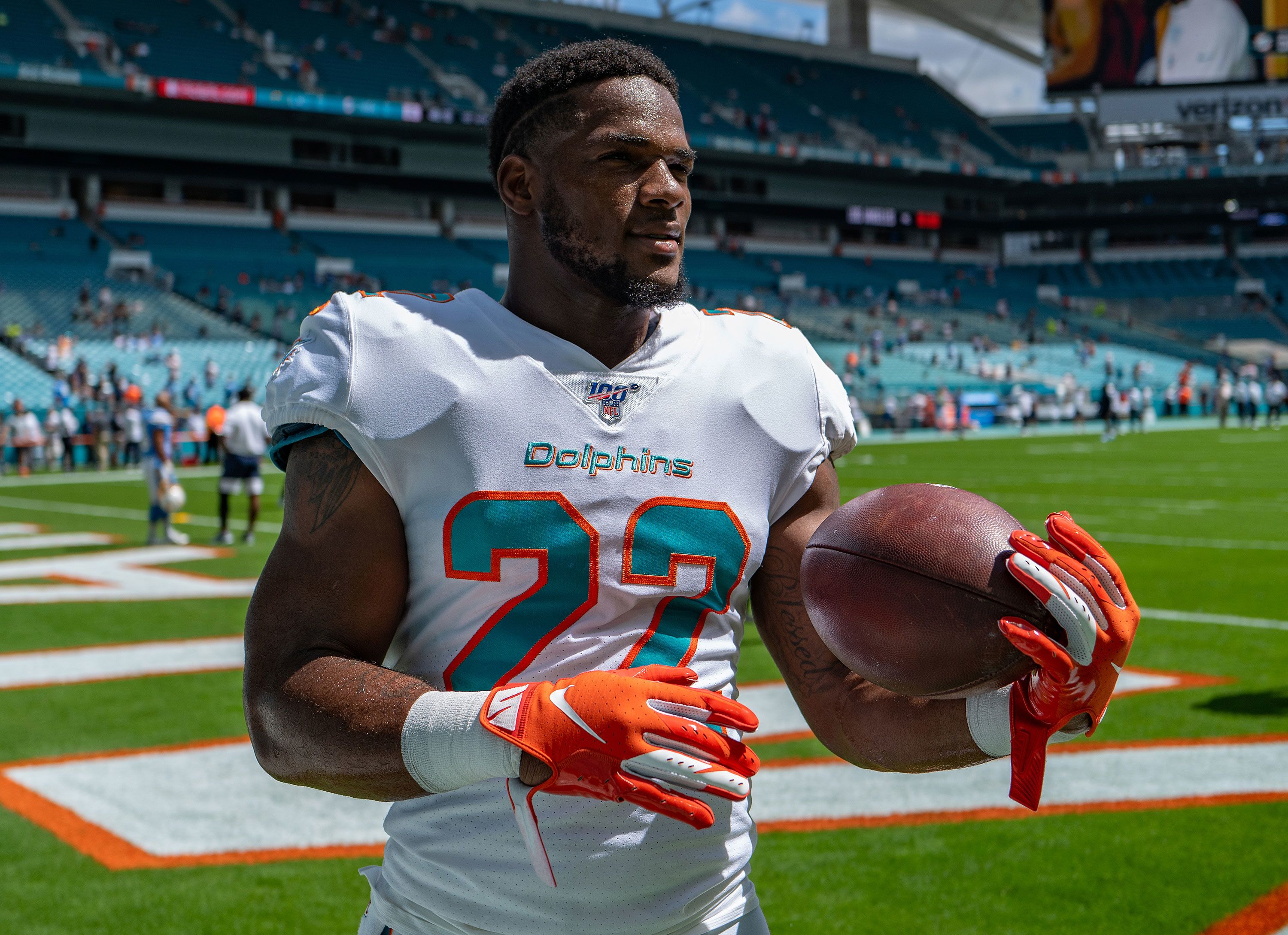 Miami Dolphins cut running back after he's accused of punching a