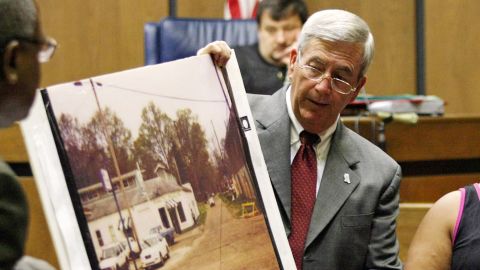 Prosecutor Doug Evans holds a photo during a trial for Curtis Flowers on June 14, 2010 in Greenwood, Mississippi.