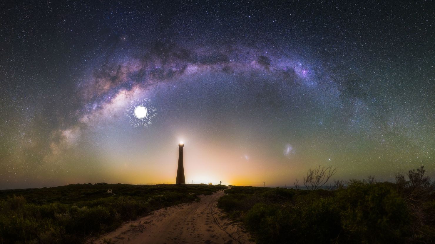 This photomosaic of 28 images shows the Milky Way arching over the Guilderton Lighthouse in Western Australia.