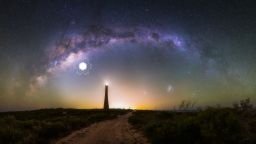 This 28 image photomosaic captures the arch of the milky way over the Guilderton Lighthouse in Western Australia, and the Large and Small Magellanic Clouds. The location of a supernova that would have exploded 9,000 years ago and been visible in the night sky is shown in the image.