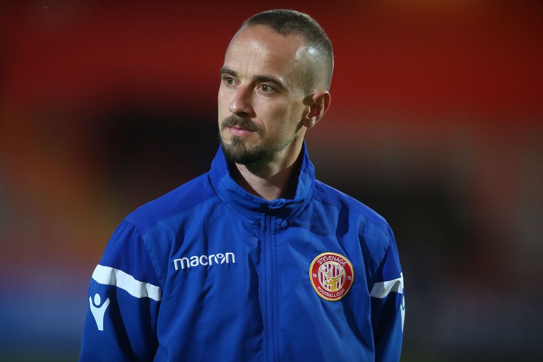 Stevenage caretaker boss Mark Sampson has been charged with using racist language. 