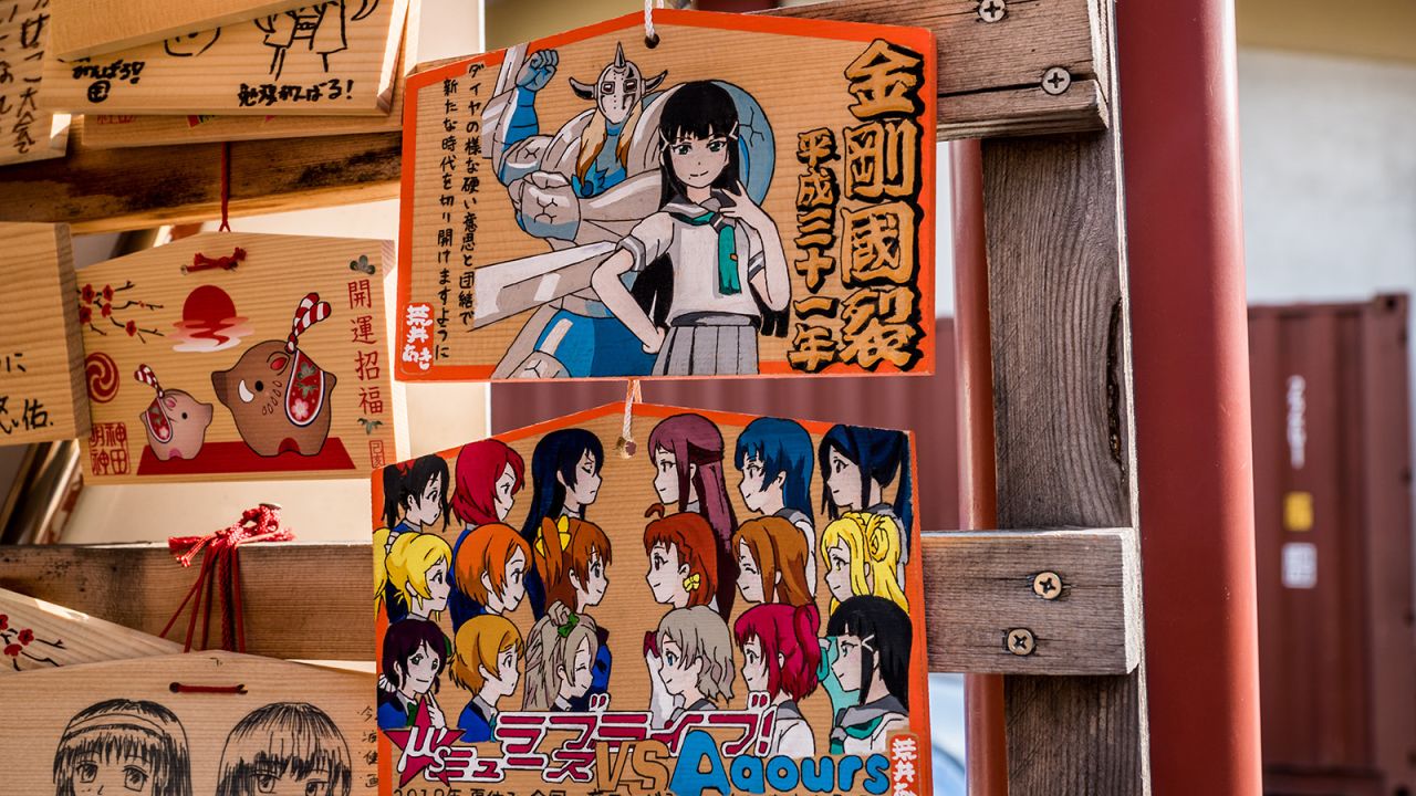 <strong>The anime temple: </strong>Ema prayer boards -- normally covered in wishes -- are instead illustrated with anime characters. 