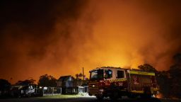 COLO HEIGHTS, AUSTRALIA - NOVEMBER 15: Flames illuminate the sky over a property on Putty road on November 15, 2019 in Colo Heights, Australia. The warning has been issued for a 80,000-hectare blaze at Gospers Mountain, which is burning in the direction of Colo Heights. An estimated million hectares of land has been burned by bushfire across Australia following catastrophic fire conditions - the highest possible level of bushfire danger - in the past week. A state of emergency was declared by NSW Premier Gladys Berejiklian on Monday 11 November and is still in effect, giving emergency powers to Rural Fire Service Commissioner Shane Fitzsimmons and prohibiting fires across the state. Four people have died following the bushfires in NSW this week. (Photo by Brett Hemmings/Getty Images)