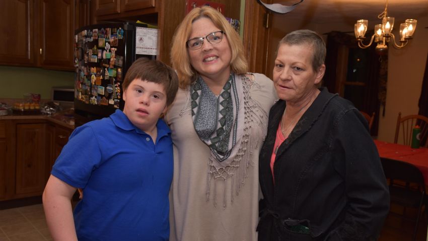 Jake Manning poses with his mom Jean Manning, right, and Kerry Bremer, who he sometimes calls Kerrymom.