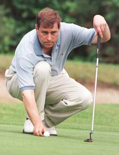 The prince lines up a putt during a celebrity golf tournament in 1998.