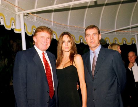Prince Andrew poses with Donald Trump and Trump's future wife, Melania, at the Mar-a-Lago estate in Palm Beach, Florida, in 2000.