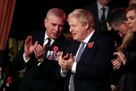 Prince Andrew talks with British Prime Minister Boris Johnson at the annual Royal British Legion Festival of Remembrance, which took place in London in November 2019.