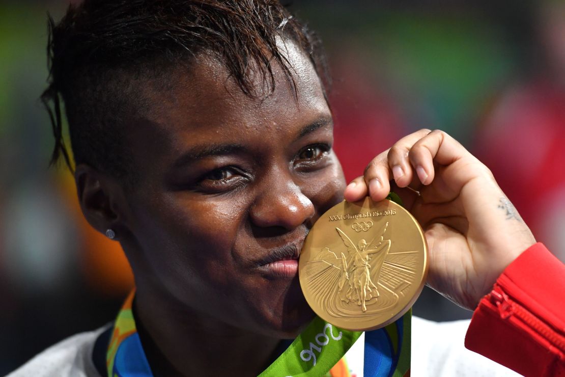 Nicola Adams poses on the podium with a gold medal during the Rio 2016 Olympic Games.