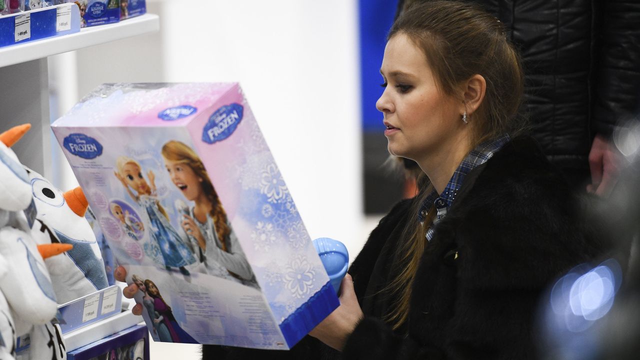 A customer examines a "Frozen 2" toy at a Disney brand toy shop, which was opened at the Central Children's Store on Lubyanka street in Moscow.