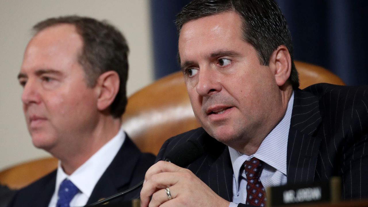 WASHINGTON, DC - NOVEMBER 20: Ranking member Rep. Devin Nunes (R) (R-CA) delivers opening remarks as committee chairman Rep. Adam Schiff (L) looks on during a hearing where Laura Cooper, the deputy assistant secretary of defense for Russia, Ukraine, and Eurasia, and David Hale, the under secretary of state for political affairs, testified before the House Intelligence Committee in the Longworth House Office Building on Capitol Hill November 20, 2019 in Washington, DC. The committee heard testimony during the fourth day of open hearings in the impeachment inquiry against U.S. President Donald Trump, whom House Democrats say held back U.S. military aid for Ukraine while demanding it investigate his political rivals.  (Photo by Drew Angerer/Getty Images)