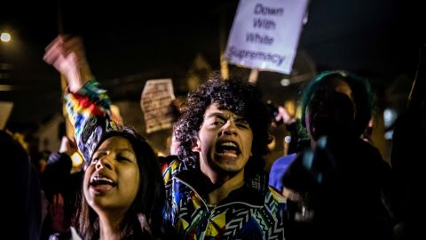 Students rally against racist incidents on Syracuse's campus Wednesday night.