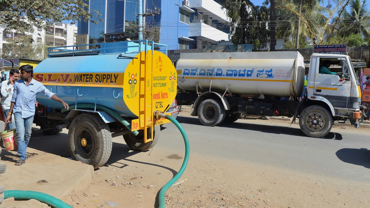 Millions in India's big tech cities depend on private water tankers because government supplies are inadequate. (Manjunath Kiran/AFP/Getty Images)