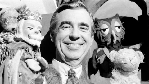 Rogers rehearsing with some of his puppet friends on the set of the show in 1984.
