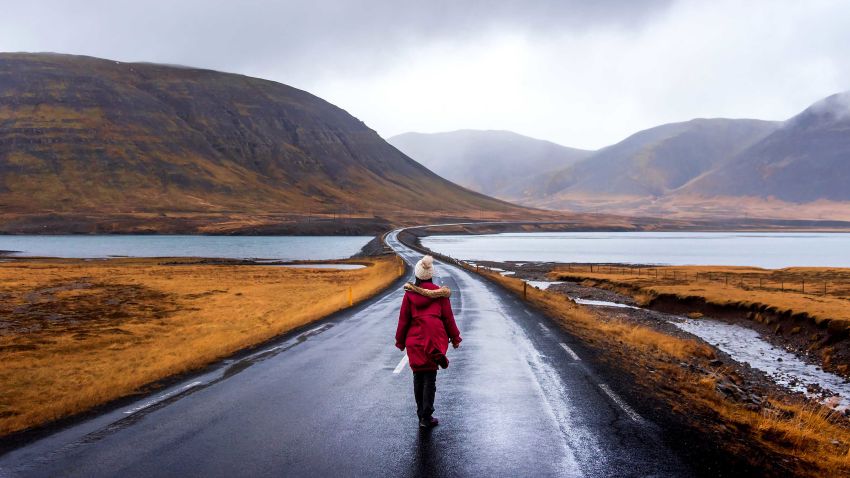 Traveler on scenic Icelandic road in Snaefellsnes peninsula of Iceland