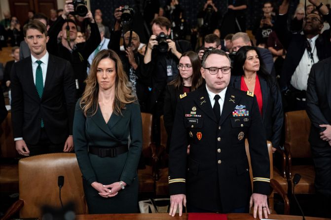 Jennifer Williams, a senior aide to Vice President Mike Pence, and Army Lt. Col. Alexander Vindman, the top Ukraine expert at the National Security Council, await the start of <a href="https://www.cnn.com/2019/11/19/politics/public-impeachment-hearing-day-3/index.html" target="_blank">their testimony</a> in Washington on November 19. It was the third day of public hearings related to t<a href="http://www.cnn.com/2019/10/03/politics/gallery/trump-impeachment-inquiry/index.html" target="_blank">he impeachment inquiry into President Donald Trump.</a>