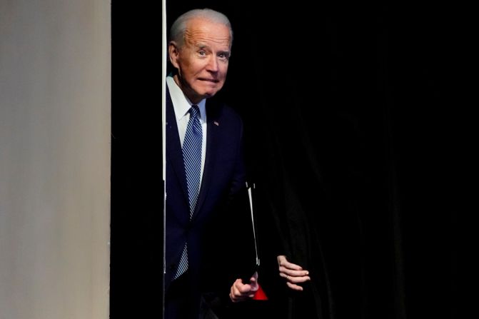 Former US Vice President Joe Biden, a Democratic presidential candidate, makes a face as he steps on stage for a campaign event in Las Vegas on Sunday, November 17.