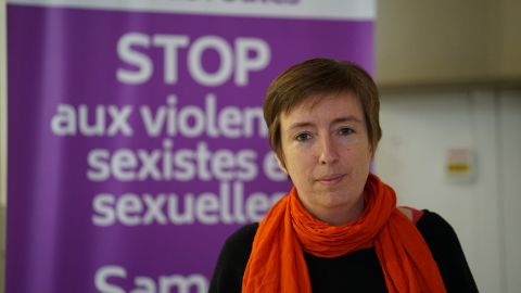 Co-founder Caroline de Haas stands in front of a poster for the group Nous Toutes, who are helping organize large scale protests about femicide and domestic violence around France.