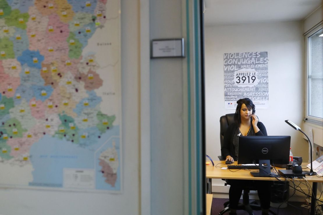 An employee of the French Fédération Nationale Solidarité Femmes (National Federation for women's solidarity) takes calls of the French national domestic sexual violence against women hotline 3919, in Paris in 2016.