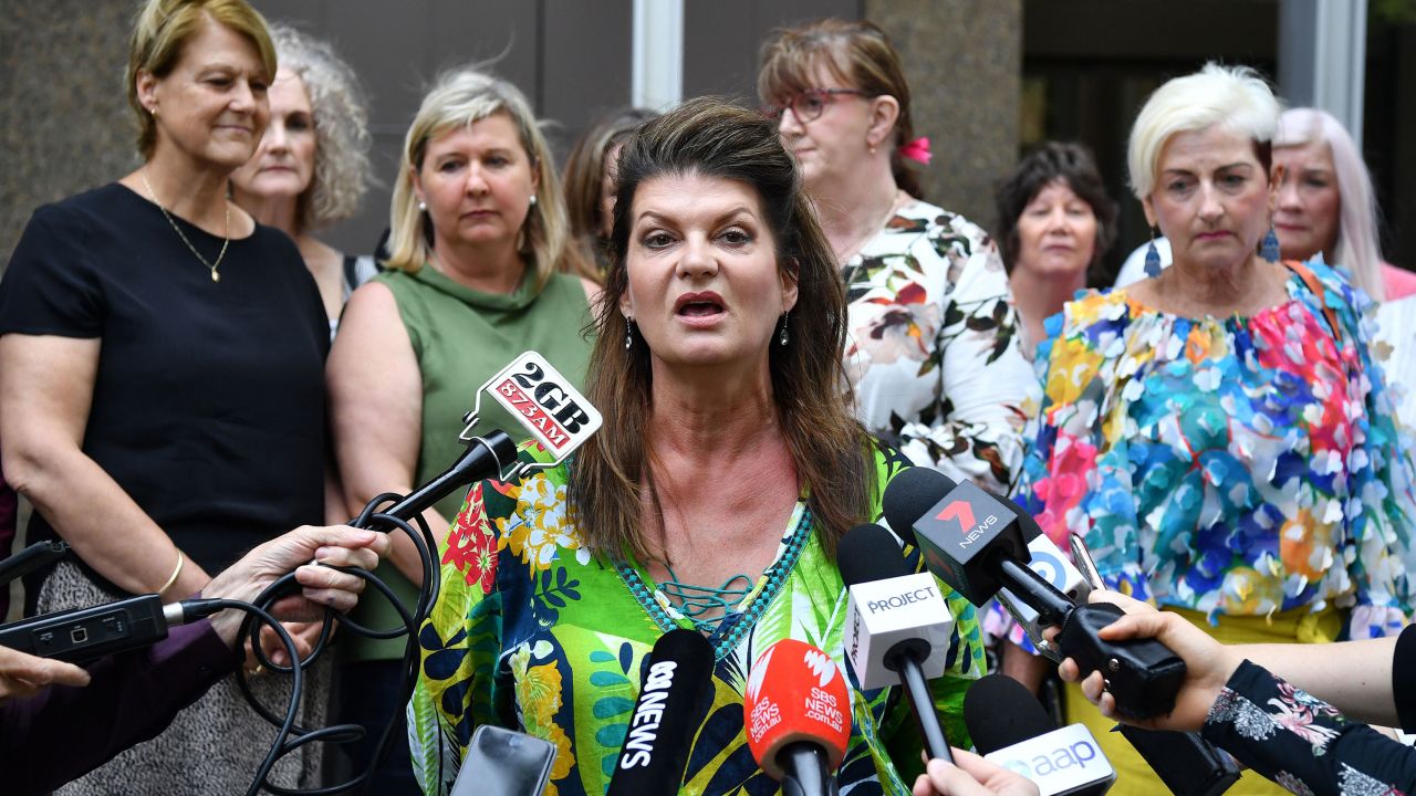 Claimant Julie Davis speaks on behalf of victims after the ruling was announced in a transvaginal mesh device class-action suit, outside the federal court in Sydney.