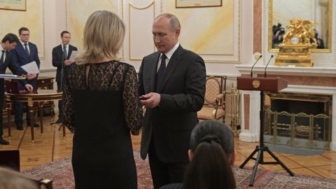 Russia's President Vladimir Putin awards Orders of Courage to the widows of the victims at a ceremony in Moscow.