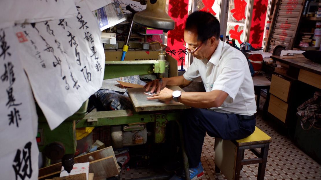 Lam has been creating handwritten storefront signs in Macao for more than 30 years.