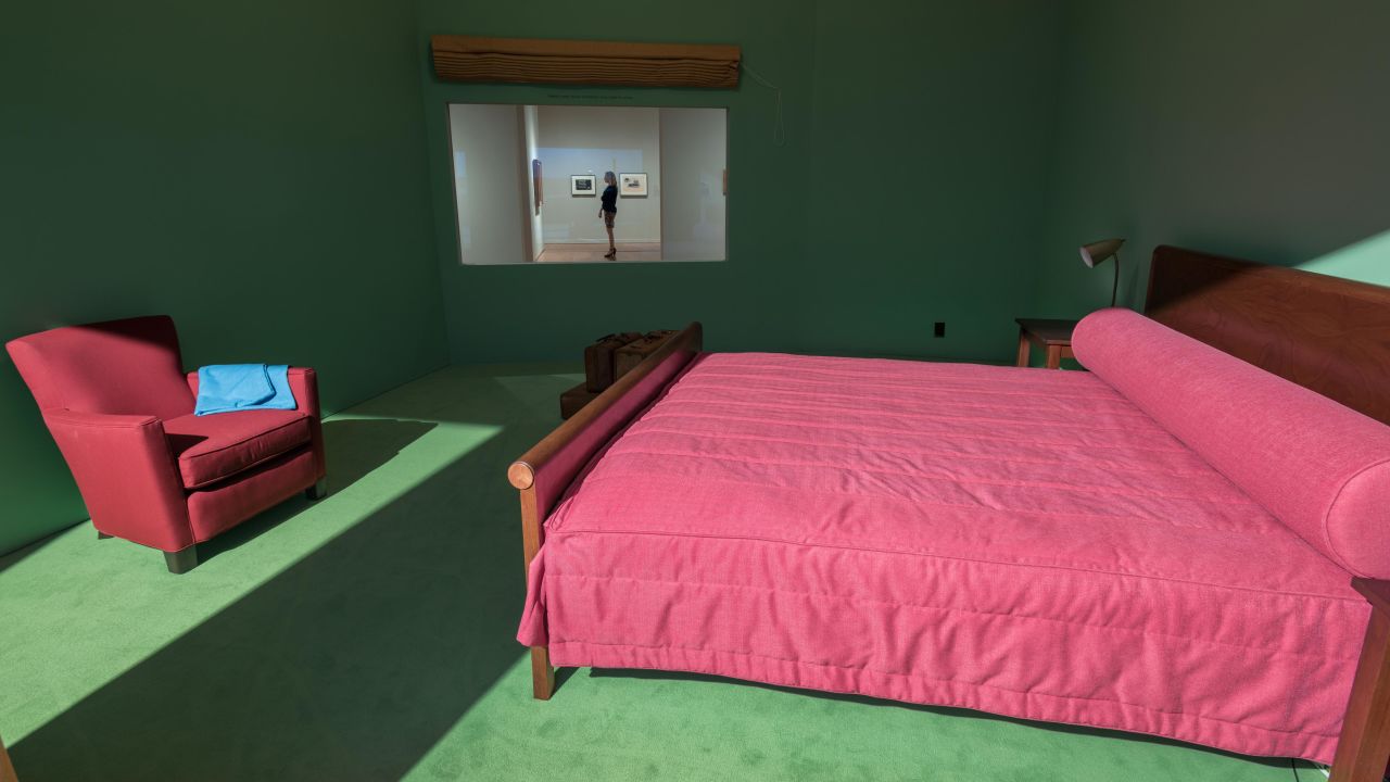 The VMFA Hopper Hotel Room has everything the "Western Motel" painting has -- minus the woman in the burgundy dress. The overnight guests are a sort of stand in.