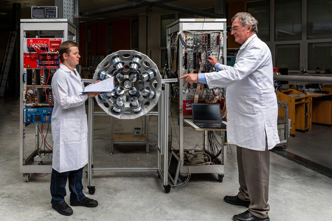Physicist Attila Krasznahorkay, right, works with a fellow researcher at the Institute for Nuclear Research at the Hungarian Academy of Sciences.