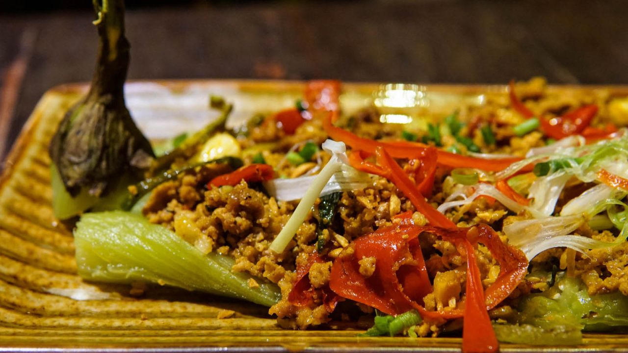 <strong>Chha trop dott (Grilled eggplant with pork): </strong>This simple dish is one of Cambodia's most accessible. Eggplant is grilled over an open flame or hot coals, then topped with minced pork fried in garlic and oyster sauce.